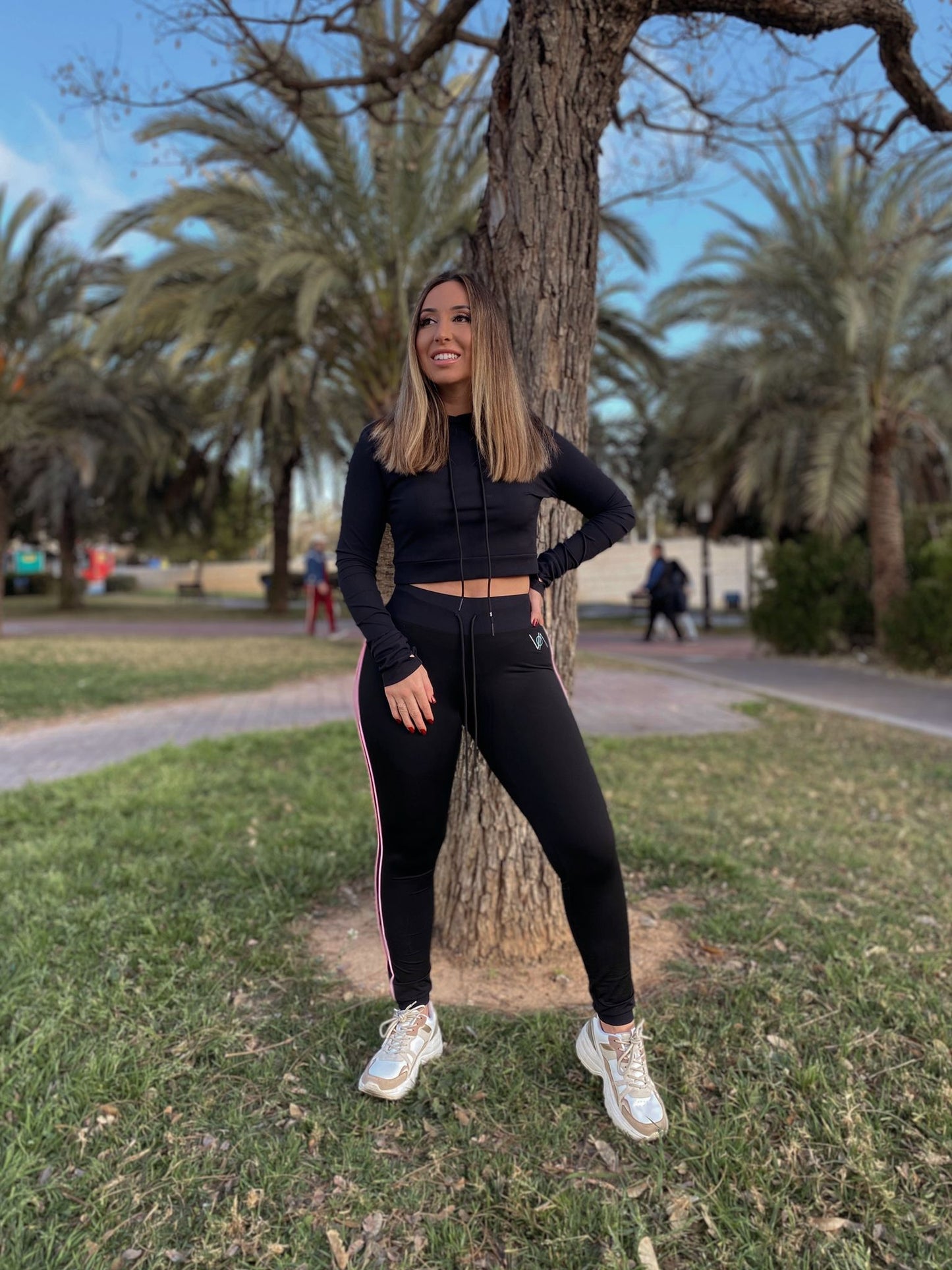 Girl wearing fitness clothing in a park